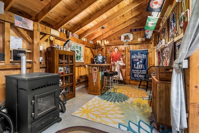 9 Jade Rd, Merrimack, NH 03054 - office featuring wood walls, a wood stove, and wooden ceiling