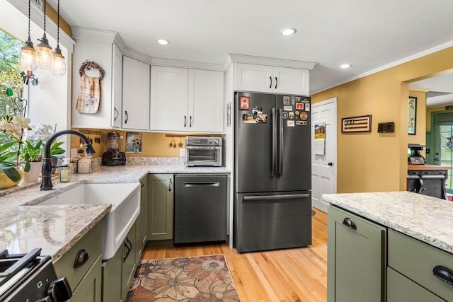9 Jade Rd, Merrimack, NH 03054 - kitchen with appliances with stainless steel finishes, white cabinets, light wood-style flooring, recessed lighting, and light stone countertops