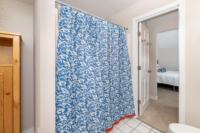 5 Golf Vw Unit B, Laconia, NH 03246 - ensuite bathroom featuring tile patterned flooring and a shower with curtain