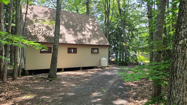10 Crescent Dr, Barnstead, NH 03225 - view of side of property with a shingled roof