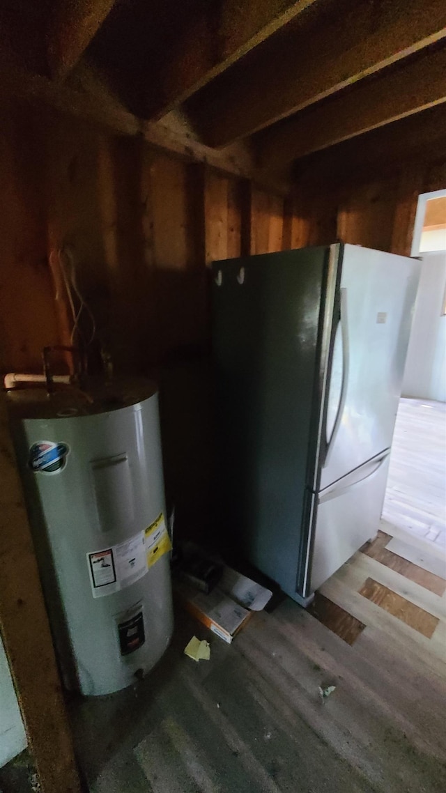 10 Crescent Dr, Barnstead, NH 03225 - kitchen with water heater, freestanding refrigerator, and wood finished floors