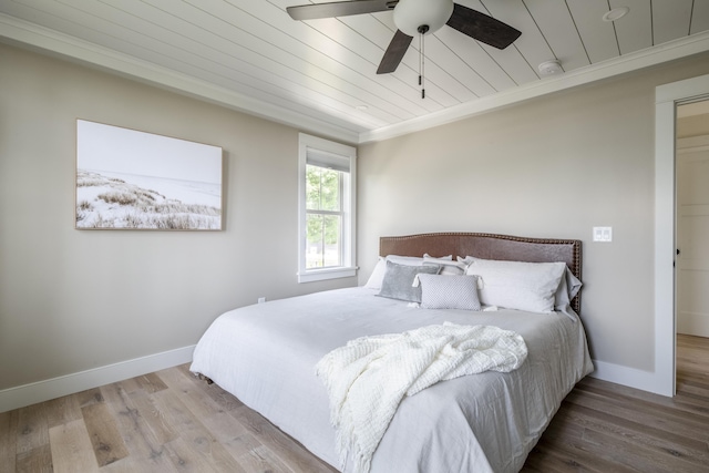 109 Weirs Blvd Unit 9, Laconia, NH 03246 - bedroom featuring wooden ceiling, wood finished floors, ornamental molding, and ceiling fan