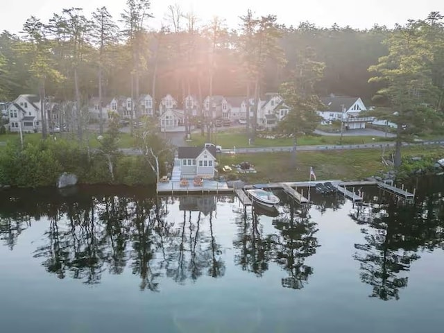 109 Weirs Blvd Unit 9, Laconia, NH 03246 - aerial view of property and surrounding area featuring a nearby body of water and nearby suburban area