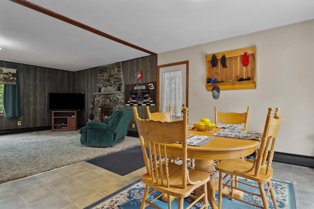 13 Seyah Rd, Shelburne, NH 03581 - dining space featuring a baseboard heating unit and wooden walls