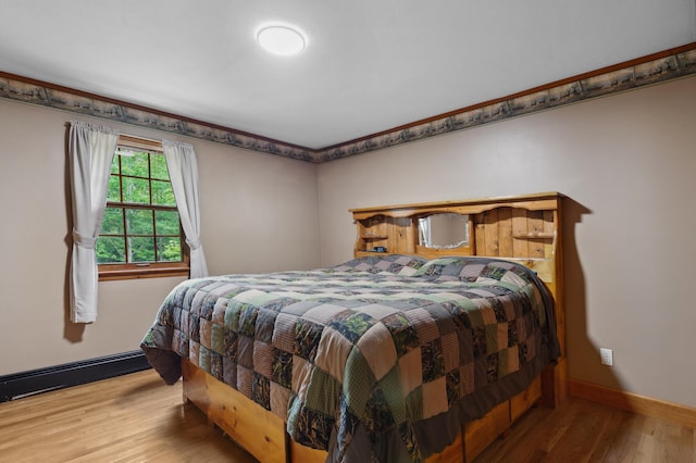 13 Seyah Rd, Shelburne, NH 03581 - bedroom featuring baseboards and wood finished floors