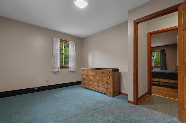 13 Seyah Rd, Shelburne, NH 03581 - unfurnished bedroom with carpet flooring and multiple windows