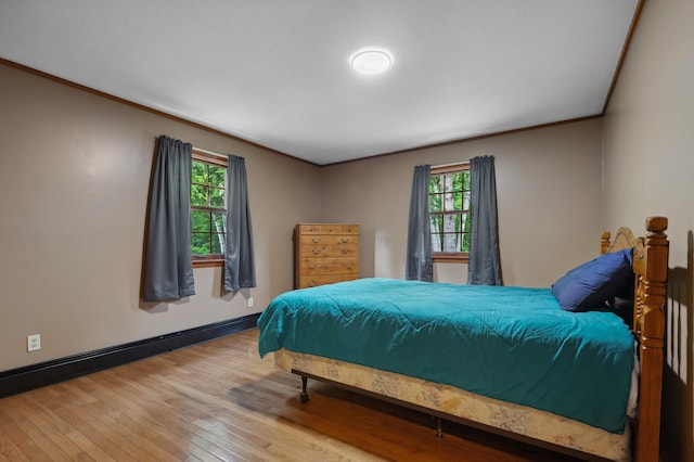 13 Seyah Rd, Shelburne, NH 03581 - bedroom featuring hardwood / wood-style flooring, ornamental molding, and baseboard heating