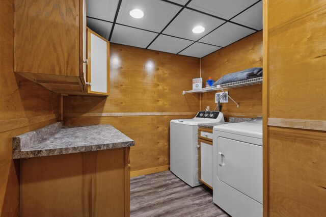 13 Seyah Rd, Shelburne, NH 03581 - washroom with washer and dryer, cabinet space, wood finished floors, recessed lighting, and wood walls