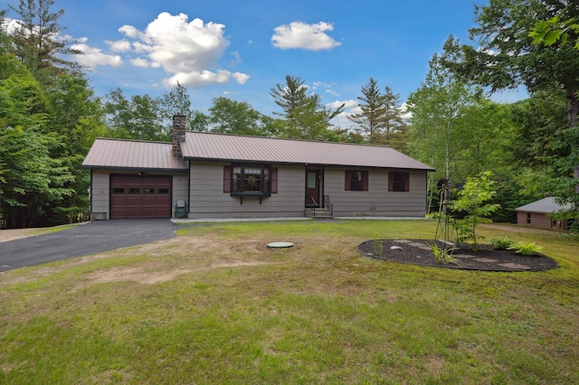 13 Seyah Rd, Shelburne, NH 03581 - ranch-style house featuring a garage, a chimney, asphalt driveway, a metal roof, and a front yard