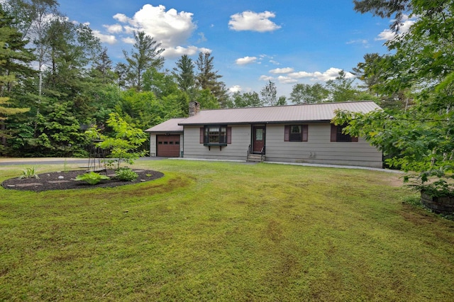 13 Seyah Rd, Shelburne, NH 03581 - view of front of home with an attached garage, asphalt driveway, a front lawn, and a chimney