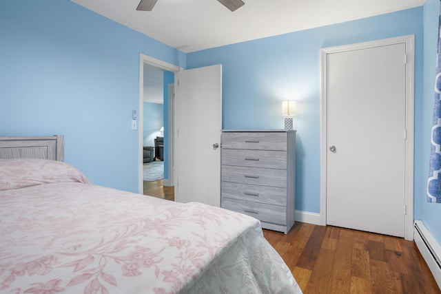 2 Autumn Leaf Dr Unit 20, Nashua, NH 03060 - bedroom featuring a baseboard heating unit, wood finished floors, and a ceiling fan