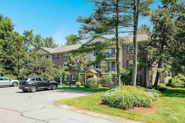 2 Autumn Leaf Dr Unit 20, Nashua, NH 03060 - view of building exterior with uncovered parking