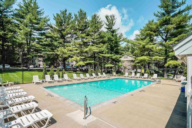 2 Autumn Leaf Dr Unit 20, Nashua, NH 03060 - community pool with a patio area and view of wooded area