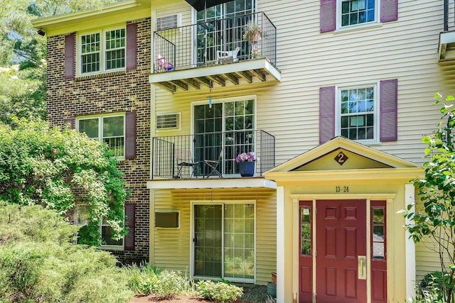 2 Autumn Leaf Dr Unit 20, Nashua, NH 03060 - view of exterior entry with a balcony