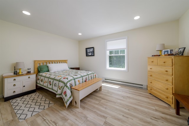 65 Glidden Rd, Croydon, NH 03773 - bedroom featuring a baseboard radiator, light wood-style flooring, and recessed lighting