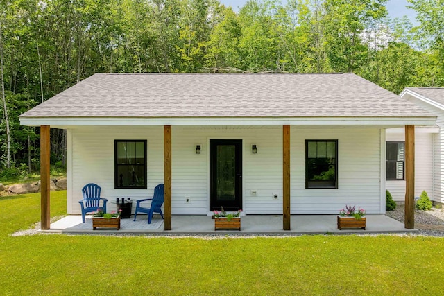 65 Glidden Rd, Croydon, NH 03773 - bungalow-style house with a shingled roof, a porch, and a front lawn