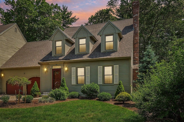 27 Olde Common Dr, Atkinson, NH 03811 - new england style home featuring a chimney, a front yard, and roof with shingles