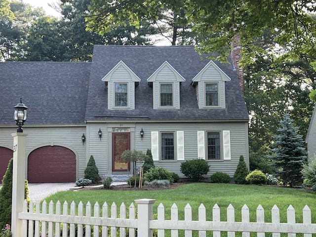 27 Olde Common Dr, Atkinson, NH 03811 - cape cod-style house with a chimney, driveway, a garage, and a shingled roof
