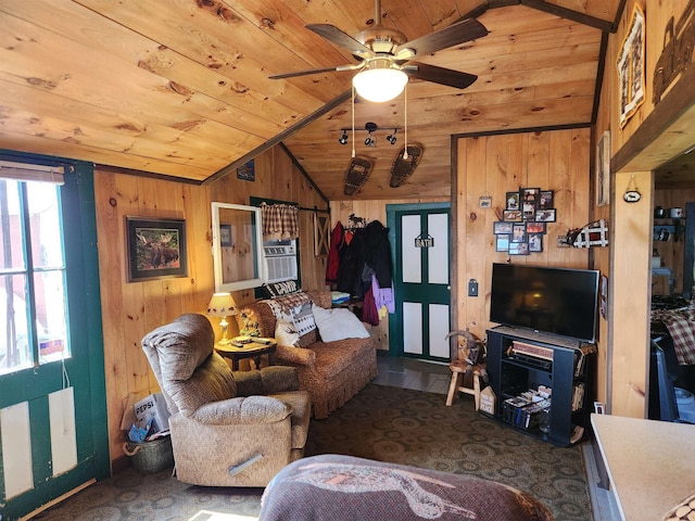106 Nanas Ln, Concord, VT 05824 - living area with wood ceiling, vaulted ceiling, wooden walls, and a ceiling fan