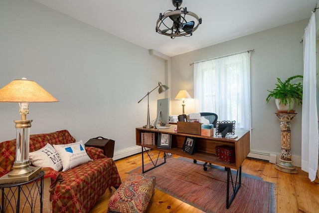 49 Mason Rd, Brookline, NH 03033 - office with wood finished floors and a baseboard heating unit