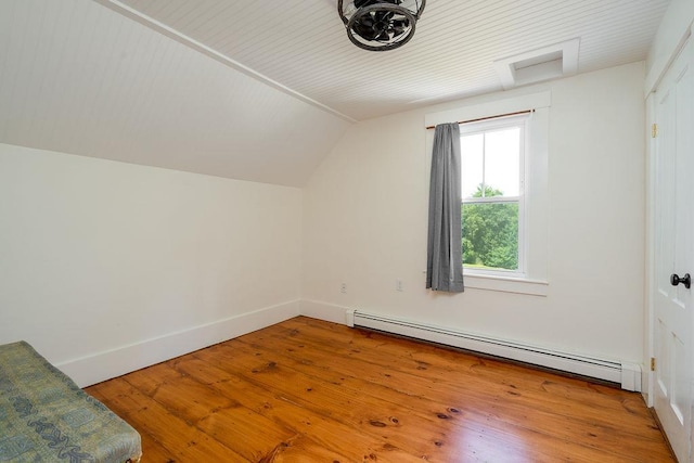 49 Mason Rd, Brookline, NH 03033 - additional living space featuring baseboard heating, attic access, vaulted ceiling, and wood-type flooring