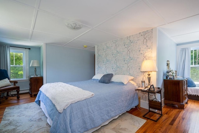 49 Mason Rd, Brookline, NH 03033 - bedroom featuring wood finished floors, multiple windows, and baseboard heating