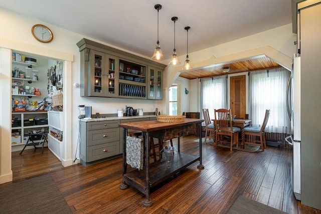49 Mason Rd, Brookline, NH 03033 - bar with dark wood-style floors, freestanding refrigerator, and pendant lighting