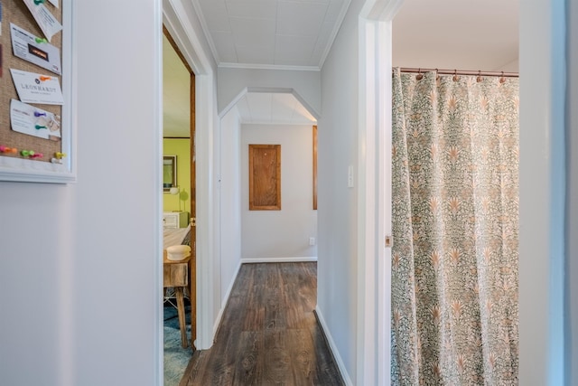 15 Prospect St, Farmington, NH 03835 - hallway featuring dark wood finished floors, crown molding, and arched walkways