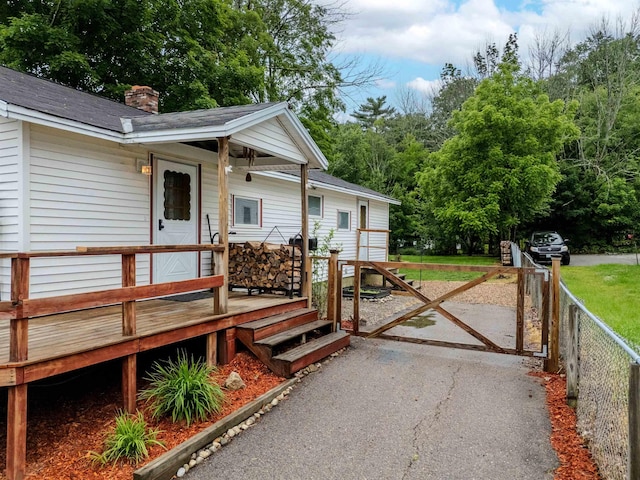15 Prospect St, Farmington, NH 03835 - wooden deck with a gate