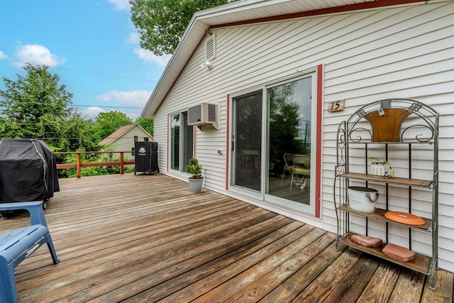 15 Prospect St, Farmington, NH 03835 - wooden terrace featuring area for grilling and an AC wall unit