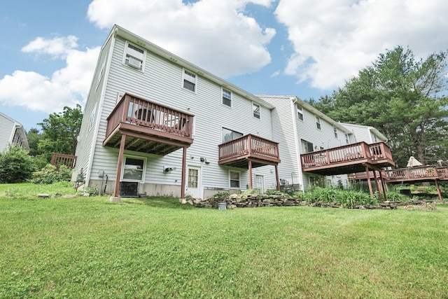 272 Winding Pond Rd Unit 272, Londonderry, NH 03053 - back of house with a yard and a wooden deck