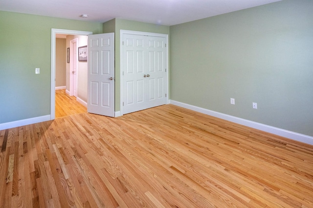 1 Sonia Dr, Dover, NH 03820 - unfurnished bedroom featuring light wood-style flooring and a closet