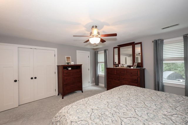 2L Homestead Dr Unit L, Derry, NH 03038 - bedroom featuring light carpet, multiple closets, and ceiling fan
