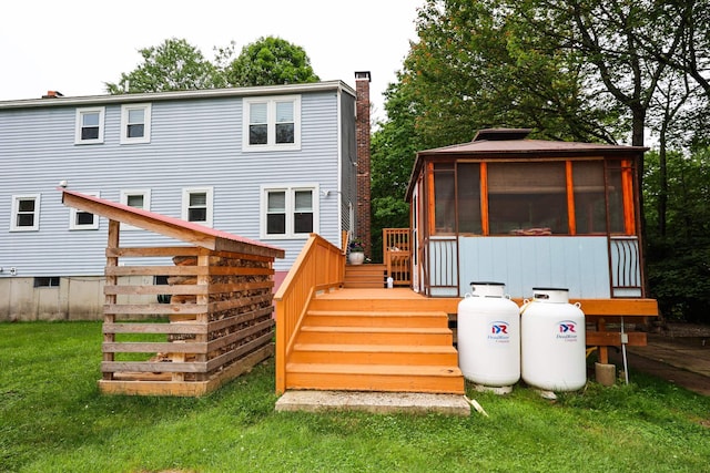 2L Homestead Dr Unit L, Derry, NH 03038 - back of property featuring a chimney, a deck, and a yard