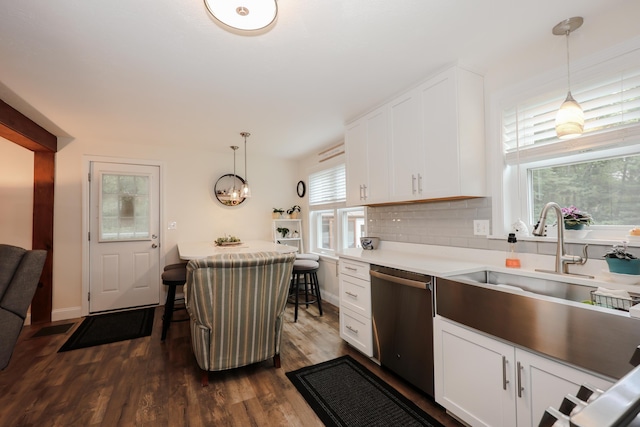 2L Homestead Dr Unit L, Derry, NH 03038 - kitchen featuring dishwasher, dark wood-style flooring, white cabinetry, decorative backsplash, and light countertops