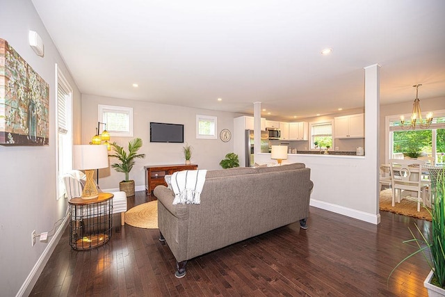 9 Marshall Rd, Kingston, NH 03848 - living room with dark wood-style flooring, recessed lighting, and a chandelier