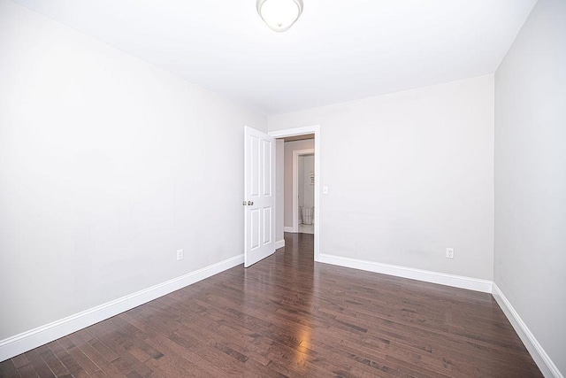 9 Marshall Rd, Kingston, NH 03848 - empty room with dark wood-style floors and baseboards