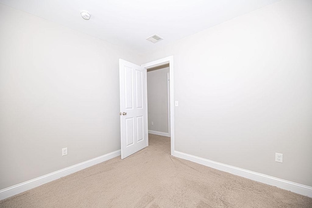 9 Marshall Rd, Kingston, NH 03848 - empty room with light colored carpet and a smoke detector