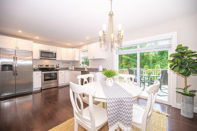 9 Marshall Rd, Kingston, NH 03848 - dining space featuring a chandelier, dark wood-style flooring, and recessed lighting
