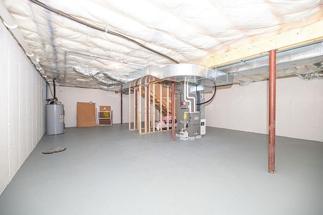 9 Marshall Rd, Kingston, NH 03848 - unfinished basement with electric water heater and heating unit