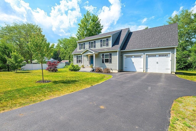 9 Marshall Rd, Kingston, NH 03848 - view of front of house with an attached garage, driveway, and a shingled roof