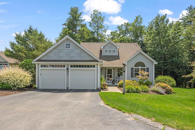 47 Misty Oak Dr, Concord, NH 03301 - view of front facade with driveway, an attached garage, roof with shingles, and a front yard