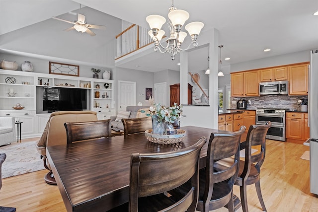 47 Misty Oak Dr, Concord, NH 03301 - dining room with a chandelier, light wood-style flooring, a ceiling fan, recessed lighting, and a towering ceiling