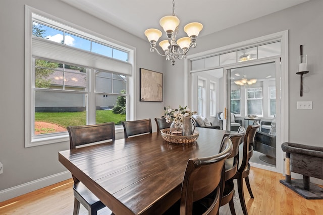 47 Misty Oak Dr, Concord, NH 03301 - dining area featuring a chandelier and light wood-style floors