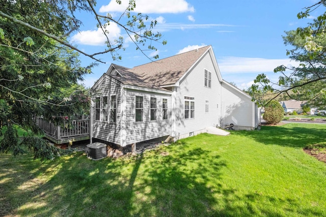 47 Misty Oak Dr, Concord, NH 03301 - view of home's exterior with a wooden deck, a yard, and a shingled roof