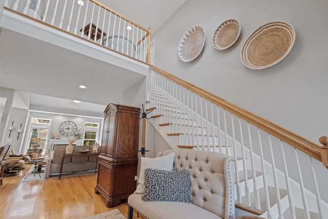 47 Misty Oak Dr, Concord, NH 03301 - staircase with wood finished floors, a towering ceiling, and recessed lighting