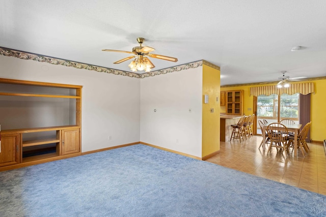 1A Rowland St, Somersworth, NH 03878 - unfurnished living room with ceiling fan and carpet flooring