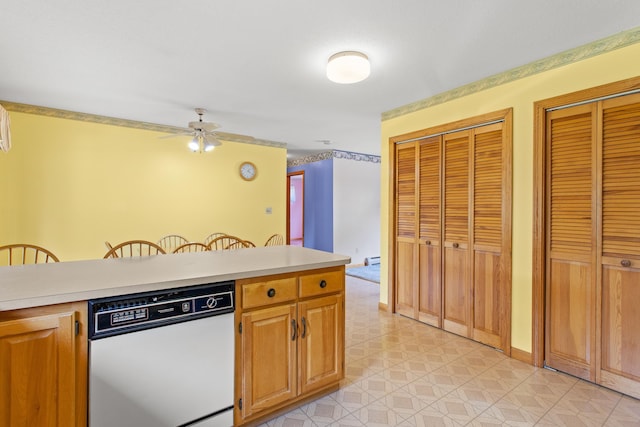 1A Rowland St, Somersworth, NH 03878 - kitchen with a ceiling fan, white dishwasher, light countertops, and light floors