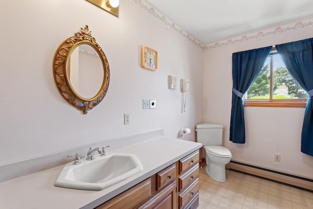 1A Rowland St, Somersworth, NH 03878 - bathroom with a baseboard heating unit and vanity