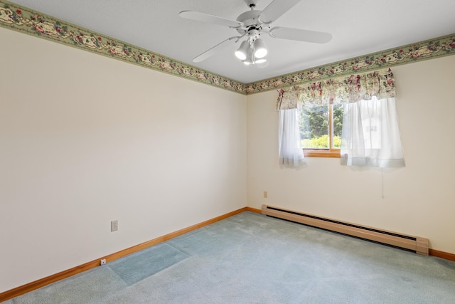 1A Rowland St, Somersworth, NH 03878 - empty room with a baseboard heating unit, carpet flooring, and a ceiling fan